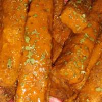 Crispy Tofu Wings (8) · Options of Sauce:
*Hot Buffalo
*BBQ
*Plaiin
*Parmesan 

Make it a meal for $15.50 (Includes ...