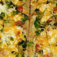 Veggie Pizza · White Sauce or Marinara Sauce

Spinach, Cherry Tomatoes ,Whole Tomatoes, Diced Tomatoes,Whit...