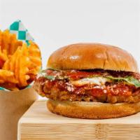 Chick’N Parm Sandwich · Golden brown plant-based southern fried Chick’n breast with marinara sauce, melted mozzarell...