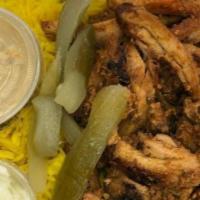 Chicken Shawarma · Served w/rice, small salad, pickles, bread, garlic sauce & free drink.