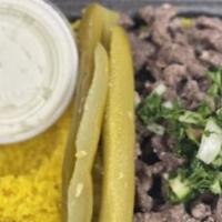 Beef Shawarma · Served w/rice, small salad, pickles, bread, garlic sauce & free drink.