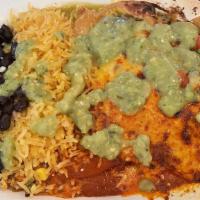 Enchiladas · 2 corn tortillas filled with choice of meat or vegetarian or cheese and onion topped with ho...