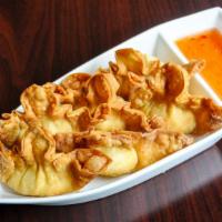 Crab Rangoons · Crispy deep-fried wontons filled with crab meat and cream cheese.