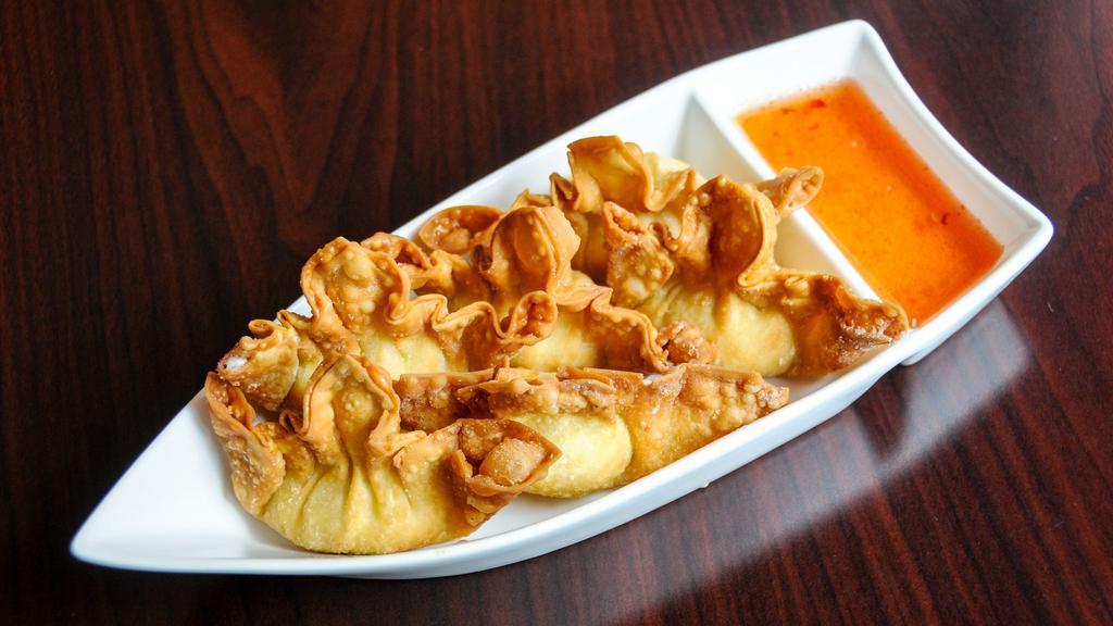 Crab Rangoons · Crispy deep-fried wontons filled with crab meat and cream cheese.