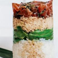 Tuna Tower · sesame and ponzu-marinated bigeye tuna, spicy crab mix, avocado and sushi rice, served with ...