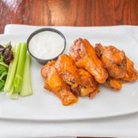Chicken Wings · Tossed with buffalo or BBQ sauce.