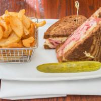 Hogan'S Reuben · lean corned beef with sauerkraut, swiss cheese and thousand island on toasted marble rye wit...