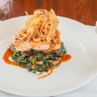 Bbq Salmon · Fresh Atlantic salmon grilled with arrowhead BBQ sauce, served with garlicky sauteed spinach...