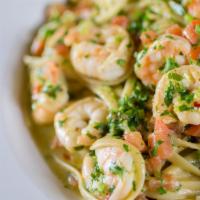 Shrimp Scampi Pasta · ribbon pasta, lemon, basil, thyme and butter with fresh tomato, parmesan and garlic