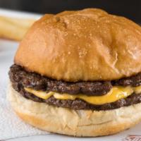 Double Cheeseburger · Served plain - two freshly ground patties served with melted cheese on a freshly baked, butt...