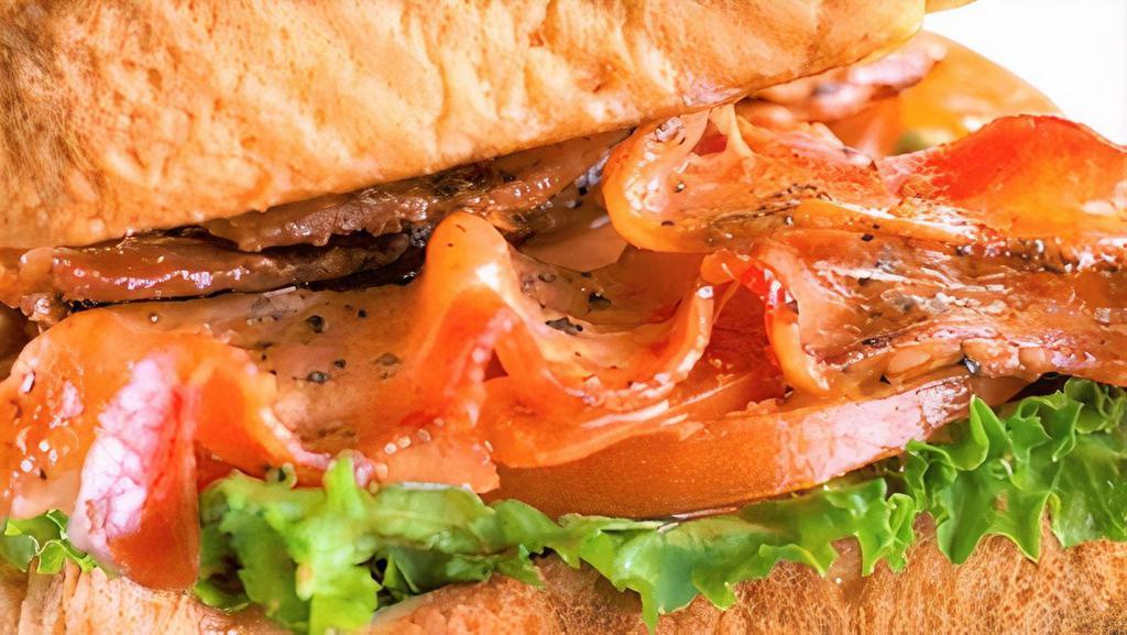 Blt · Classic bacon, lettuce, and tomato sandwich served with dressing on toast