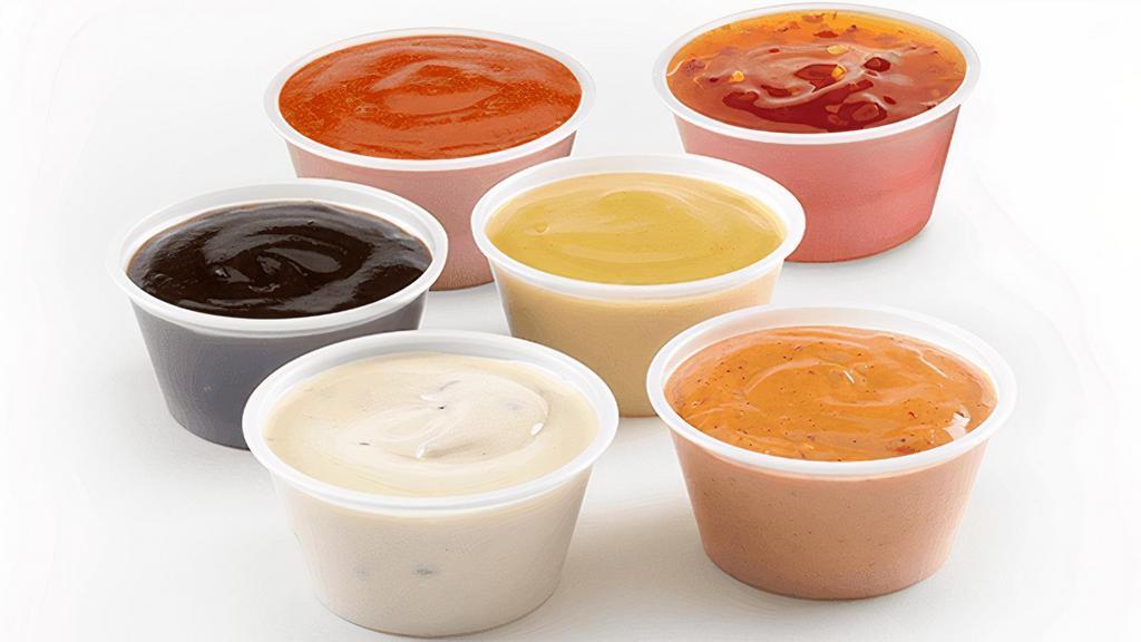 Dipping Sauces · Elevate your meal with our signature dipping sauces. Whether you like it sweet or want a little kick, we have a perfect sauce for you.
