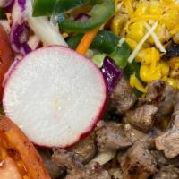 Fully Loaded Rice Bowl · Seasoned rice, New York Strip or chicken breast, shredded cheese, sautéed onion/mushroom/tom...