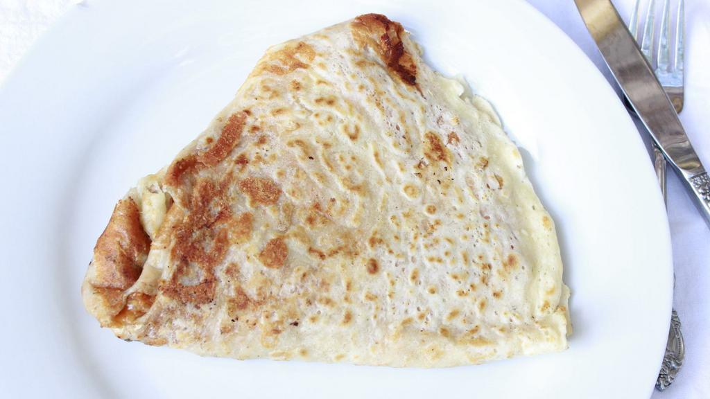 Pizza-Style Crepe · Our made-from-scratch garlic marinara sauce and melted mozzarella cheese folded inside a golden crepe
