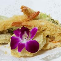 Shrimp Tempura · Lightly fried in a japanese batter served with vegetables and tempura sauce. served with cho...
