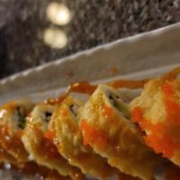 Godzilla Roll · (Avocado, cream cheese, ebi) tempura fried roll, sweet chili sauce, masago.