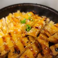 Teriyaki Chicken Stone Bowl · Grilled Chicken tossed with teriyaki sauce on top