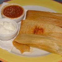 Tamales · Three tamales filled with your choice of pork in a green tomatillo sauce or shredded pork in...