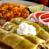 Enchiladas Suizas · Most popular. three corn tortillas filled with chicken, topped with melted Mexican cheese, g...