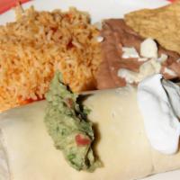 Burrito Dinner · Most popular. Filled with beans, lettuce, tomatoes and your choice of ground beef, steak, ch...