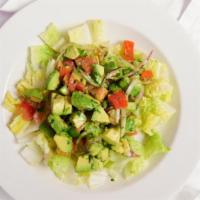 Ensalada De Aguacate /  Avocado Salad · Romaine lettuce, iceberg lettuce, avocado, tomatoes, onions and cilantro.