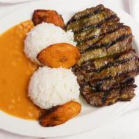 *Menestra De Carne/ Grilled  Rib-Eye Steak · Grilled rib-eye steak served with white rice, yellow beans, and fried sweet plantains.