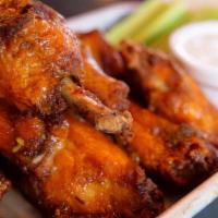 Wings · 1 pound of fresh wings, par baked with a cajun house rub, deep fried and tossed with your ch...