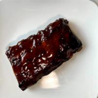 Half Slab — Memphis-Style Smoked Bbq Ribs · A half slab of our Red Top Farms baby back ribs rubbed down with Smokeheads Sweet and Tangy ...