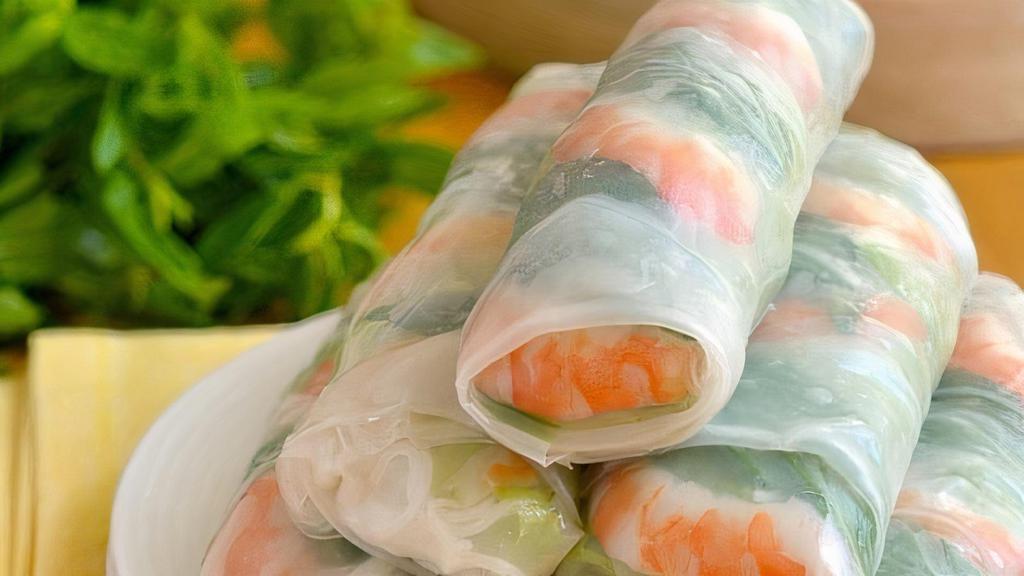 Soft Spring Roll (2) · Soft rice paper wrapped with vermicelli, lettuce, cilantro, carrot, and cucumber. Served with house peanut sauce.
