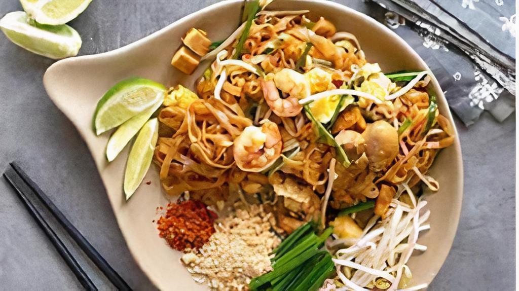 Pad Thai (Combo Protein) · Thailand's national dish: stir fried rice noodles, egg, green onion, bean sprouts, crushed peanuts, with lime wedge.

Chicken, Beef, Pork, Tofu, Shrimp, Crabmeat, or Calamari.