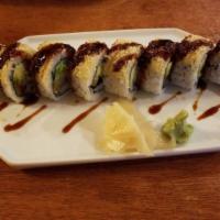 Crunch Roll · Fried shrimp, crab stick, avocado, cucumber topped with tempura flake. Drizzled with eel sau...