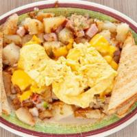 Bob'S Skillets · Grilled potatoes with onions and green peppers covered with cheese and topped with 2 eggs. W...