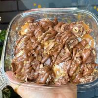 Hazelnut Crunch Mini Pancakes · Classic batter, hazelnuts, fererro rocher chocolates, signature hazelnut cream, and S.S.S.