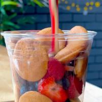 Mixed Berry Fruit Cup · Mini pancakes, strawberries, blueberries, raspberries, blackberries with a side of mixed ber...
