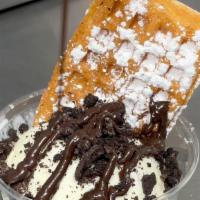 Waffle Sundaes · Enjoy a scoop of ice cream with a waffle and toppings of your choice!