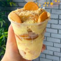 Banana Pudding Cup · Banana pudding, vanilla wafers, bananas, and mini pancakes.