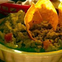 Guacamole With Chips & Salsa · Chicago's best guacamole made fresh with every order. Guaranteed to be to your liking!