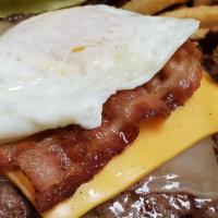 Breakfast Burger · Charbroiled burger topped with cheddar cheese, bacon, fried egg, lettuce tomato and onion. S...