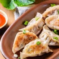 Steam/ Fried Dumplings (8) · Choice of steamed or fried dumplings filled with pork and vegetables.