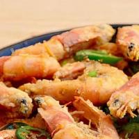 Salt & Pepper Shrimp · Fried shrimp cooked with jalepenos and seasoned with salt and pepper.