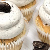 Cookie Blast · A buttery vanilla cake baked with chopped Oreos, cookies, and cream buttercream, and topped ...