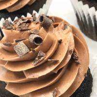 Chocolate Truffle Cupcake · A rich chocolate cake infused with Bavarian cream, filling, vanilla buttercream and topped w...
