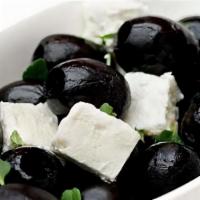 Feta And Olives · Greek feta cheese and kalamata olives, topped with oregano and extra virgin olive oil.