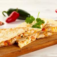 Quesadilla A La Diabla · A spicy choice with a large flour tortilla filled with chorizo, shredded chicken and cheese....