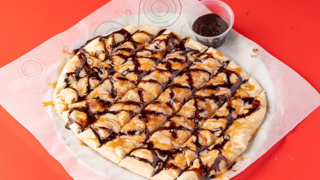Dessert Breadsticks  · Our signature dough blended with organic cane sugar and your choice of toppings Cinnamon / Chocolate / Caramel