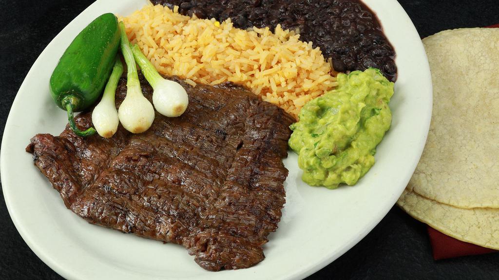Carne Asada · Charbroiled skirt steak. Served with Mexican rice, refried beans, guacamole, pico de gallo, grilled onions, and peppers.