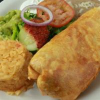 Chimichanga · Deep-fried burrito filled with your choice of meat and topped with guacamole, pico de gallo ...