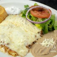Enchiladas Suizas · Three rolled corn tortillas stuffed with your choice of meat or cheese, covered with our hot...
