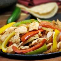 Chicken Fajitas · A sizzling hot choice accompanied by caramelized Spanish onions, diced tomato, sauteed green...