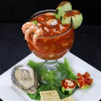 Vuelve A La Vida · A large mixture of crab, octopus, shrimp, and oysters. Mixed with avocado, tomatoes, cilantr...